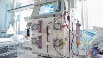 Cleaning and disinfecting the dialysis machine.